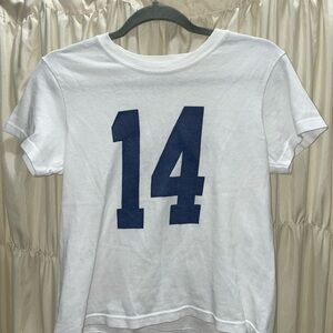 Brandy Melville John Gault women’s white T shirt number 14 logo in navy print.